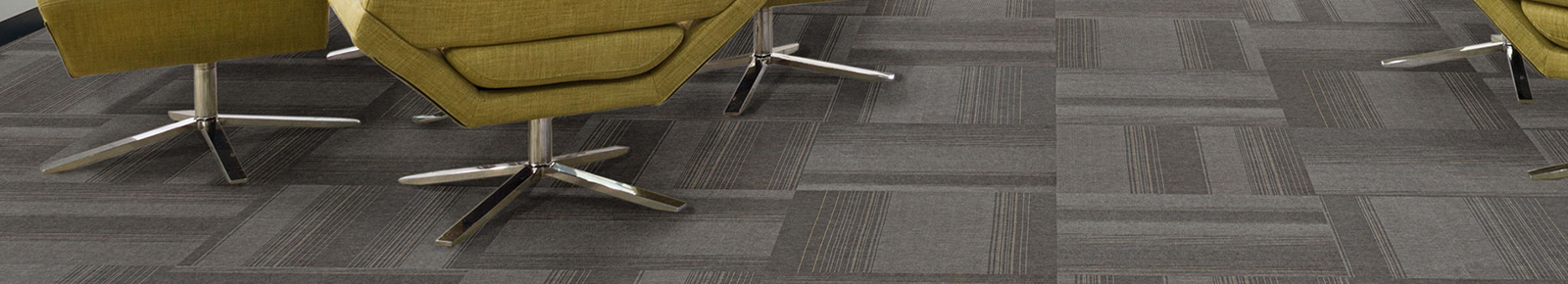 Patterned carpet tiles on office floor